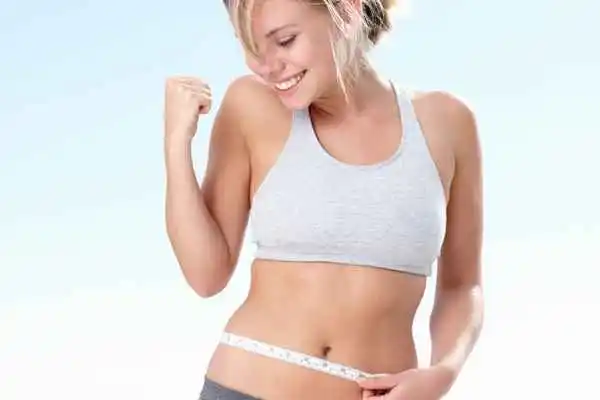woman happy after fat reduction treatment Lancaster