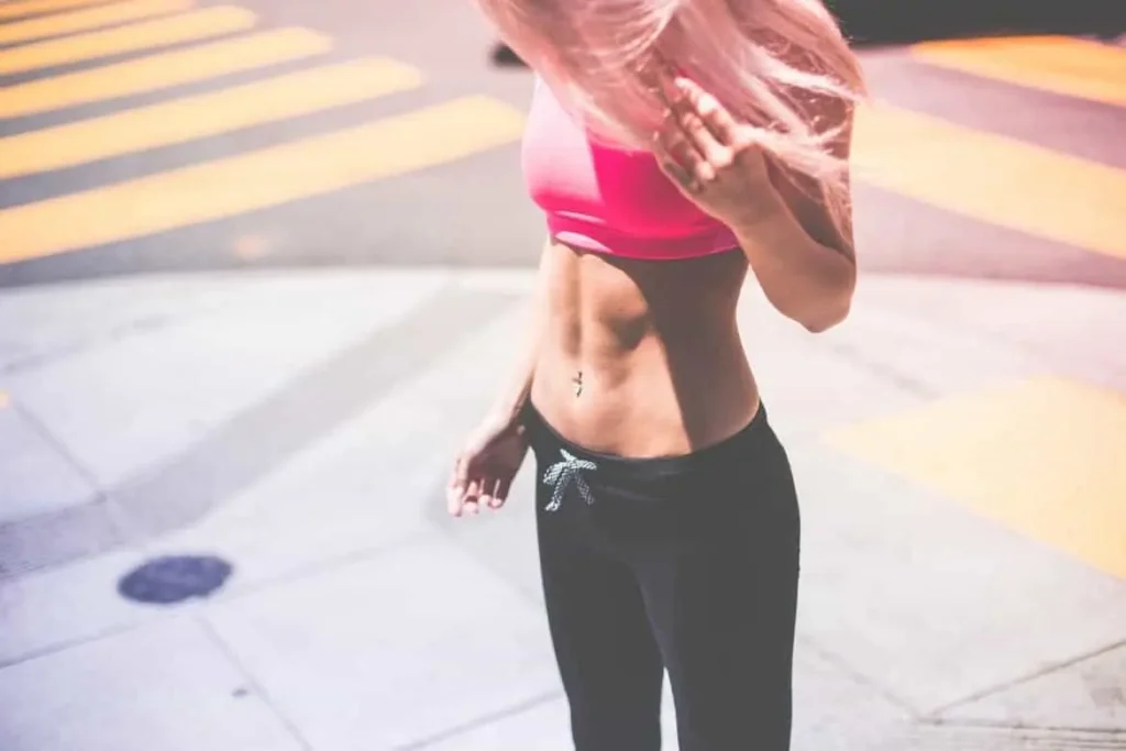 Woman with toned stomach after LA-EMS Body Sculpting Treatment Lancaster